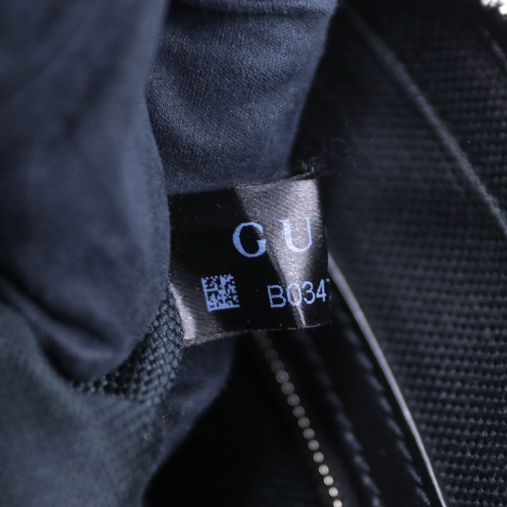 Gucci GG Supreme Clutch Bag