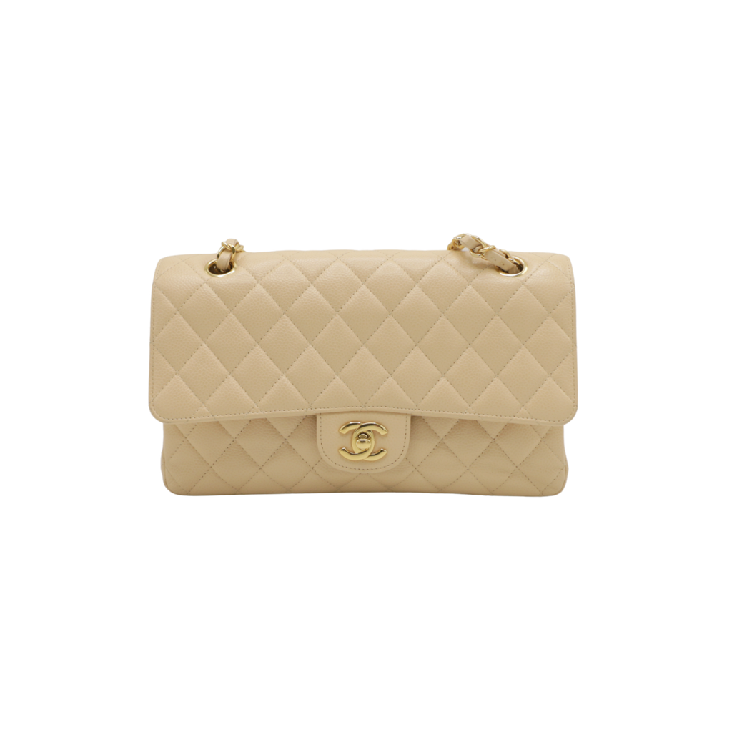 Chanel Medium Classic Double Flap bag crafted from caviar leather with beige gold-tone hardware