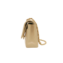 Chanel Medium Classic Double Flap bag crafted from caviar leather with beige gold-tone hardware