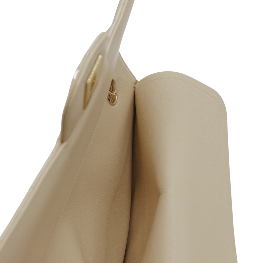 Chanel Medium Classic Double Flap bag crafted from caviar leather with beige gold-tone hardware