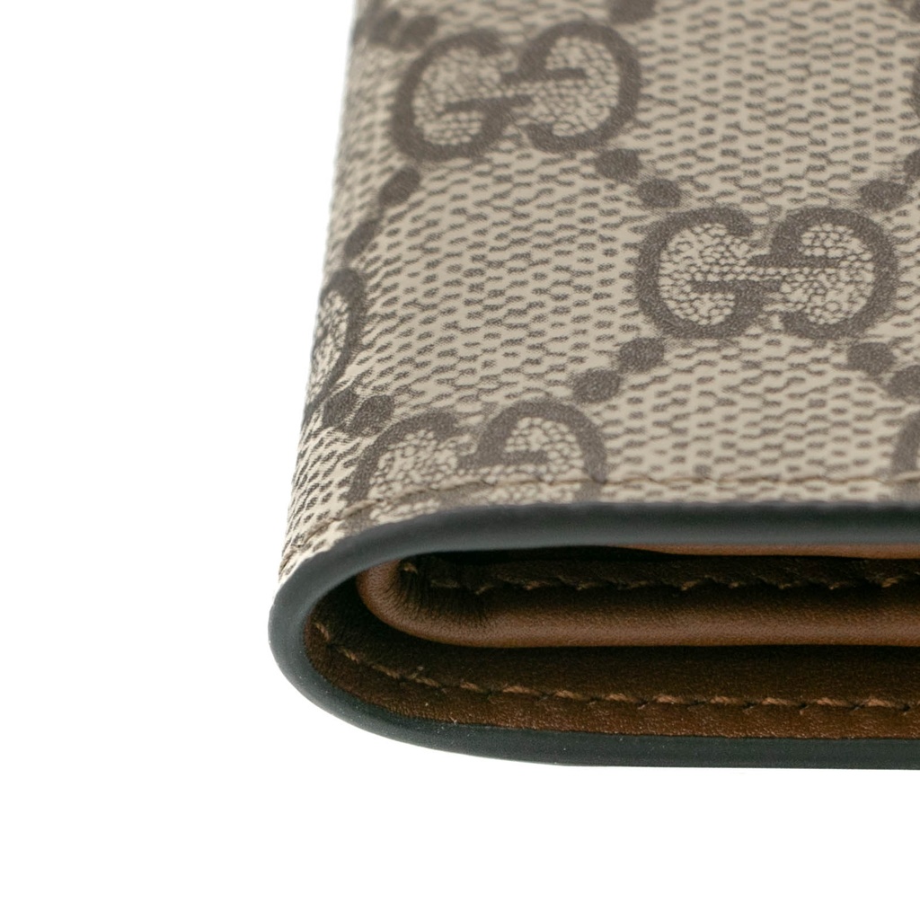 Gucci GG Emblem Bi-Fold Wallet In Brown Fabric 821206
