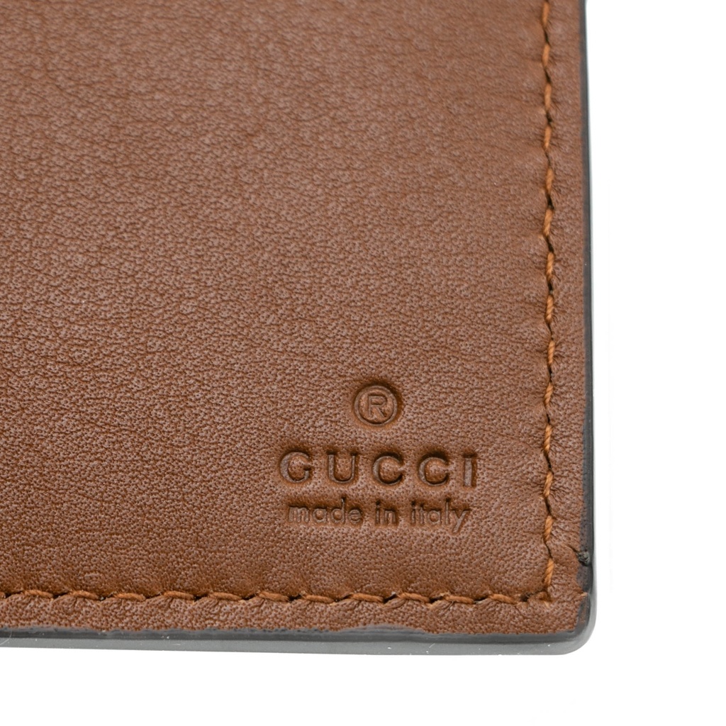 Gucci GG Emblem Bi-Fold Wallet In Brown Fabric 821206