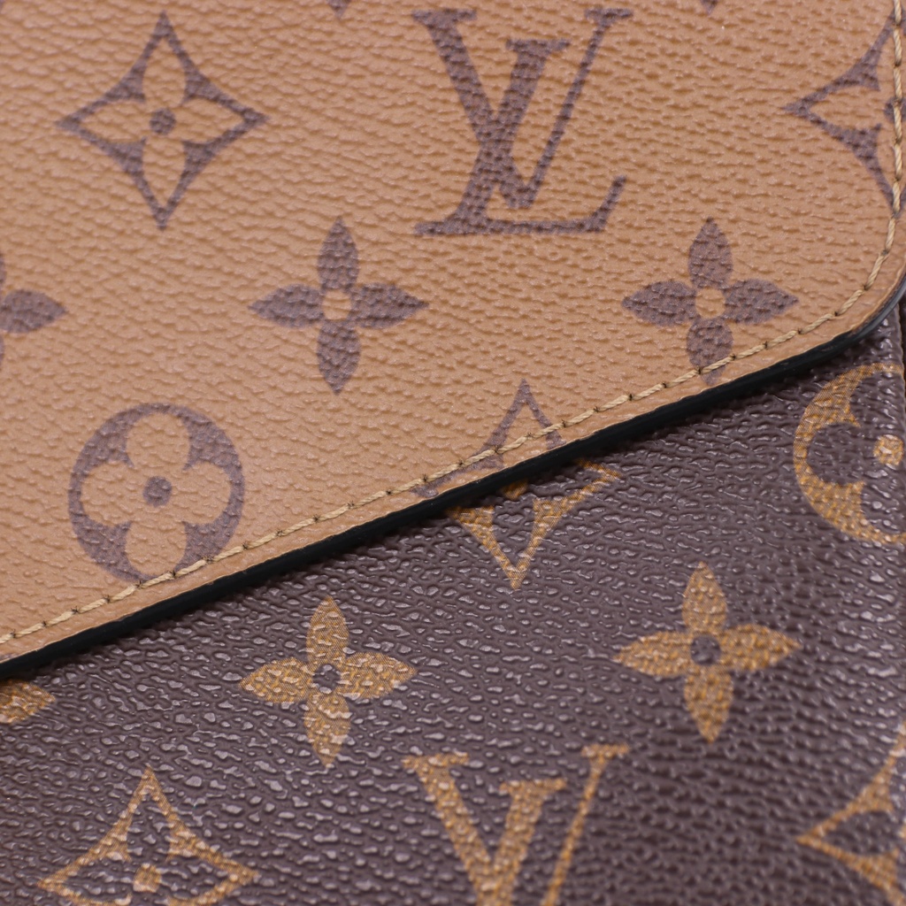 Louis Vuitton Pochette Metis Reverse Monogram Canvas Bag