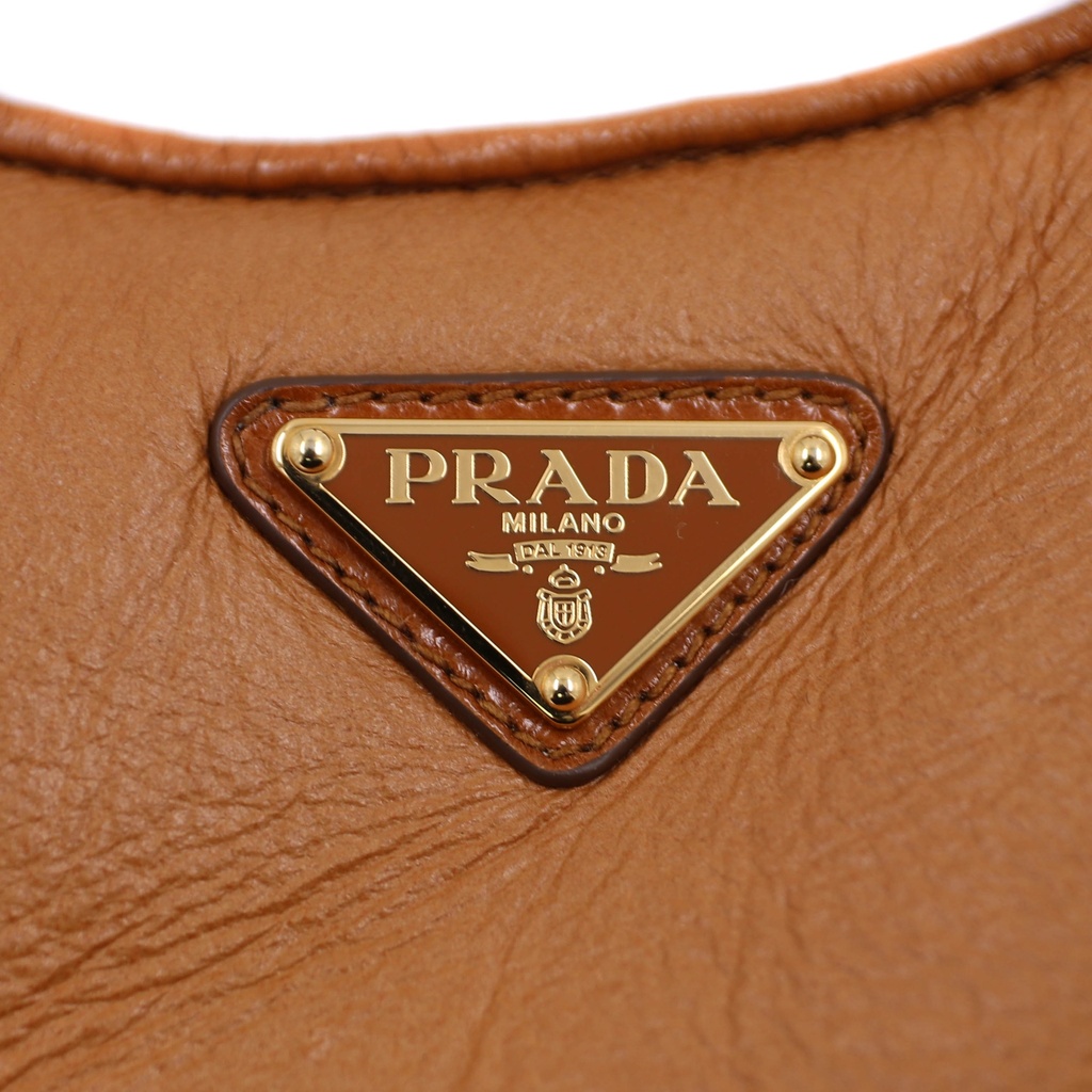 Prada Arqué Small Shearling Shoulder Bag in Beige