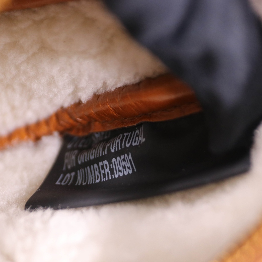 Prada Arqué Small Shearling Shoulder Bag in Beige