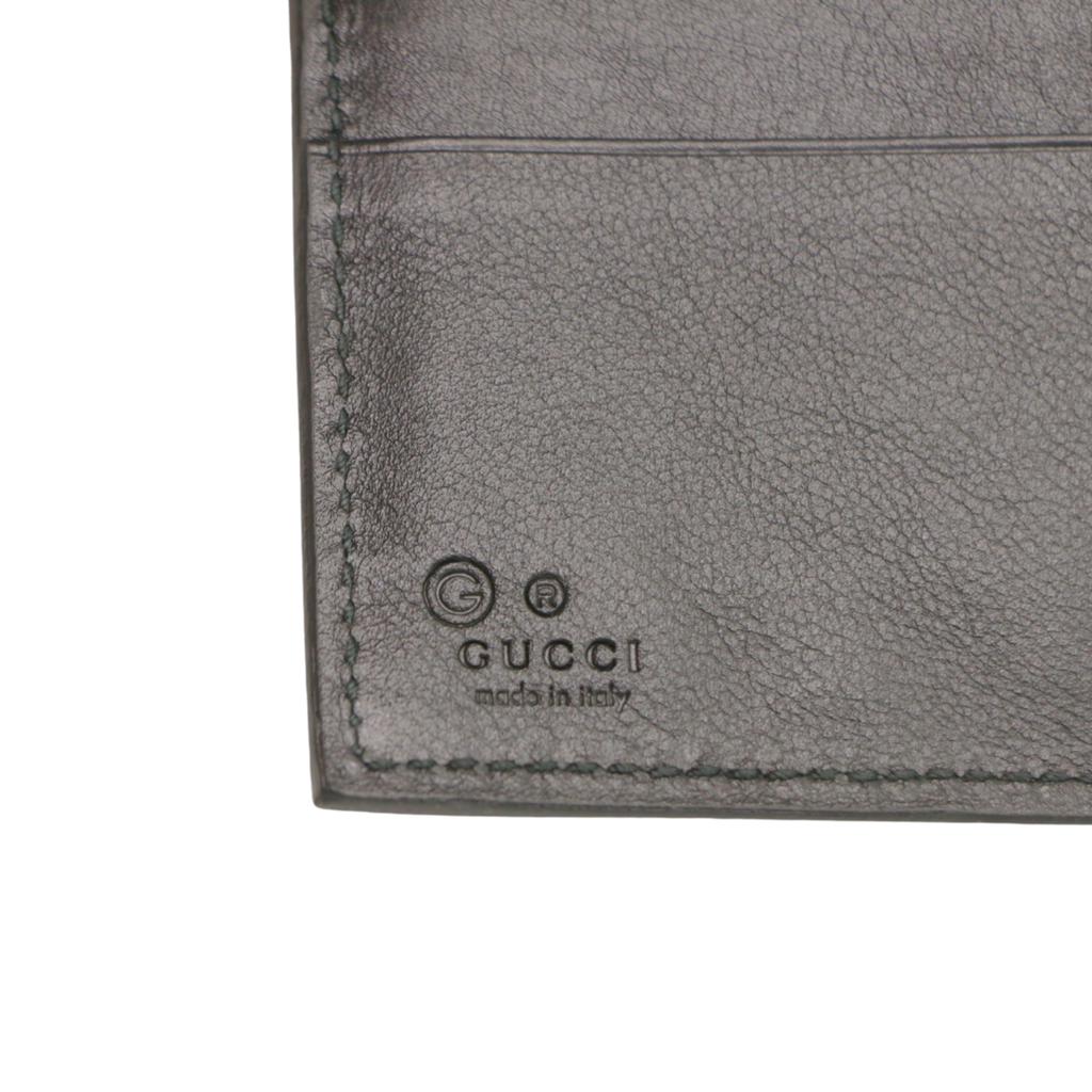 Gucci Microguccissima Passport Holder In Black Leather