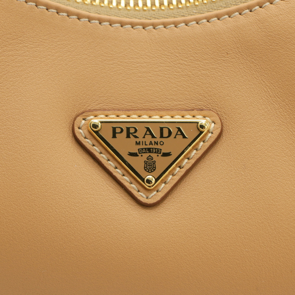 Prada Logo-Plaque Shoulder Bag in Beige