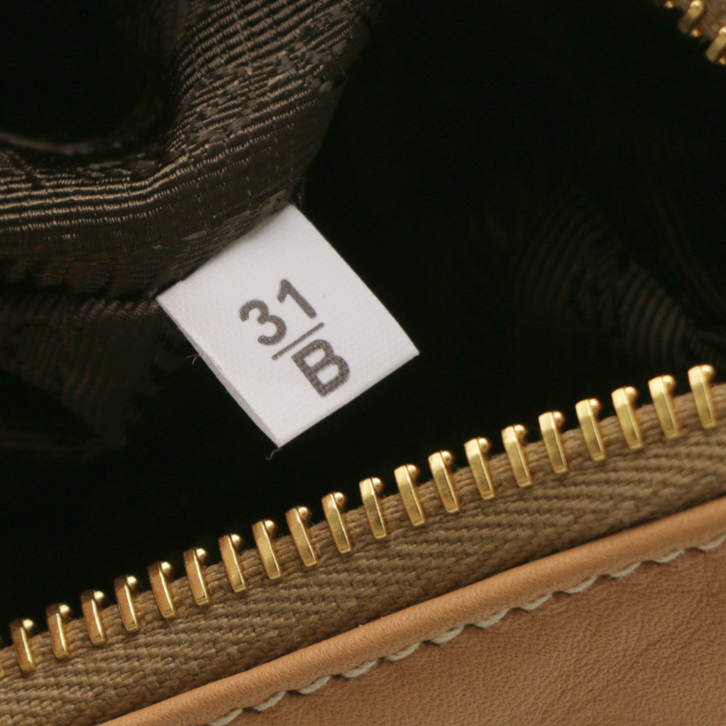 Prada Logo-Plaque Shoulder Bag in Beige