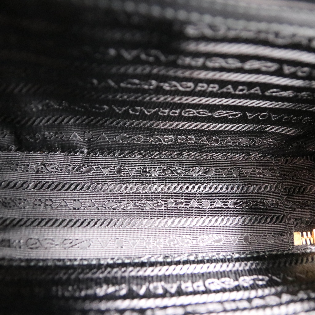 Prada Saffiano Travel Small Brique Crossbody Bag in Gold