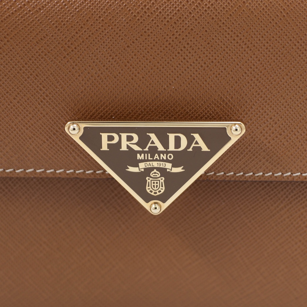 Prada Saffiano Leather Mini Crossbody Bag in Beige