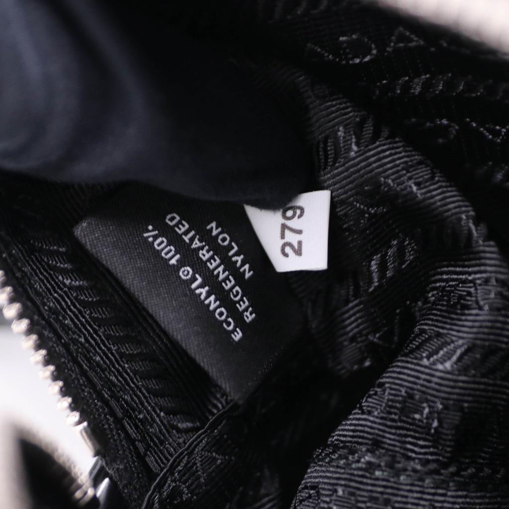 Prada Re-Nylon in Black Saffiano leather pouch