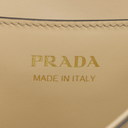 Prada Arqué leather shoulder bag with flap Camel