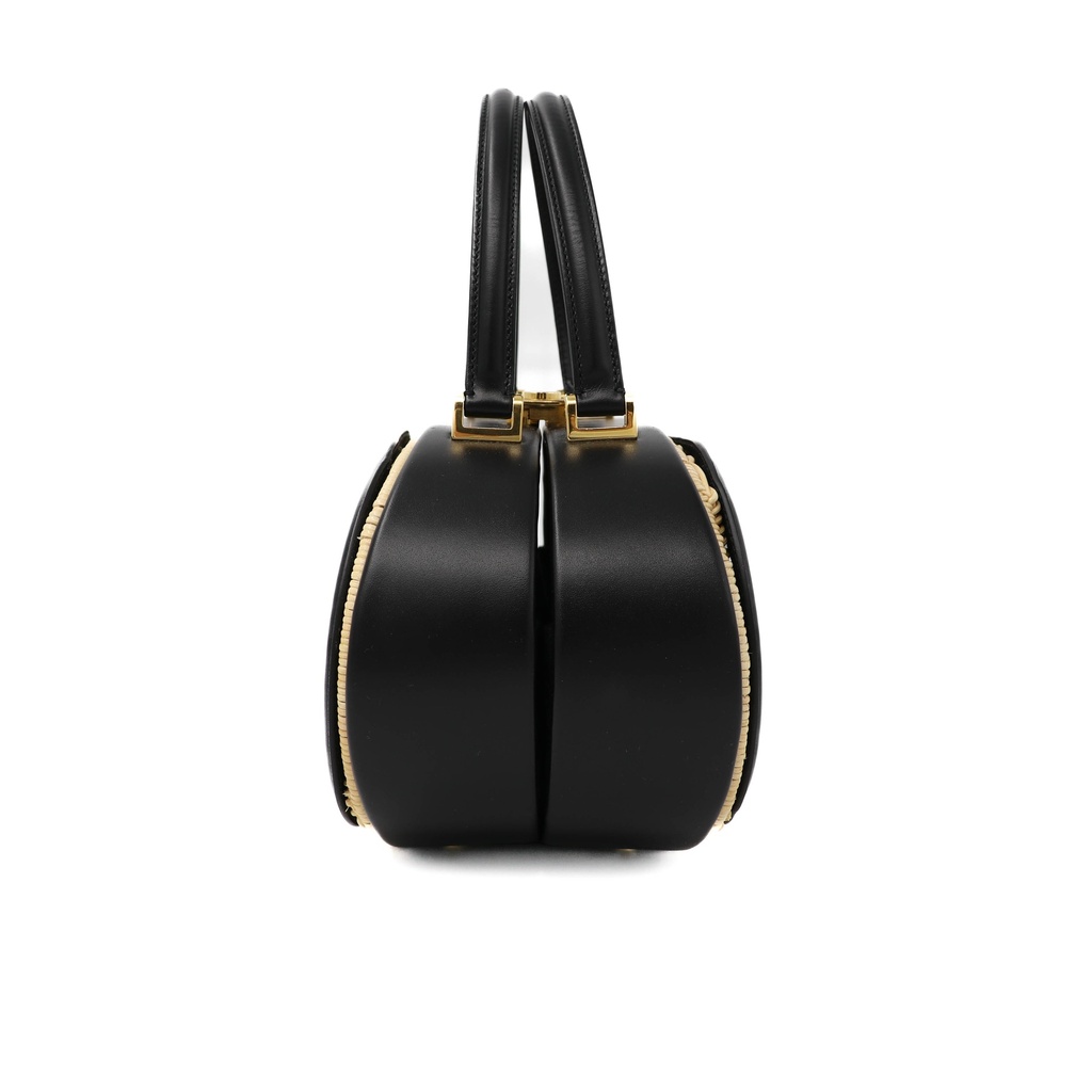Christian Dior Wicker CD Vanity Bag crafted from black leather and natural wicker