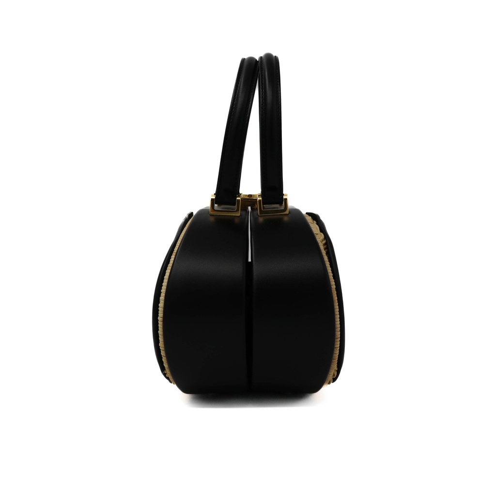 Christian Dior Wicker CD Vanity Bag crafted from black leather and natural wicker