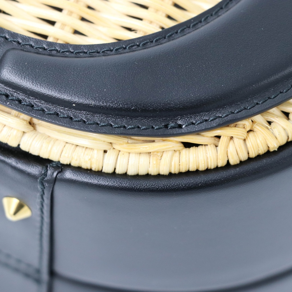 Christian Dior Wicker CD Vanity Bag crafted from black leather and natural wicker