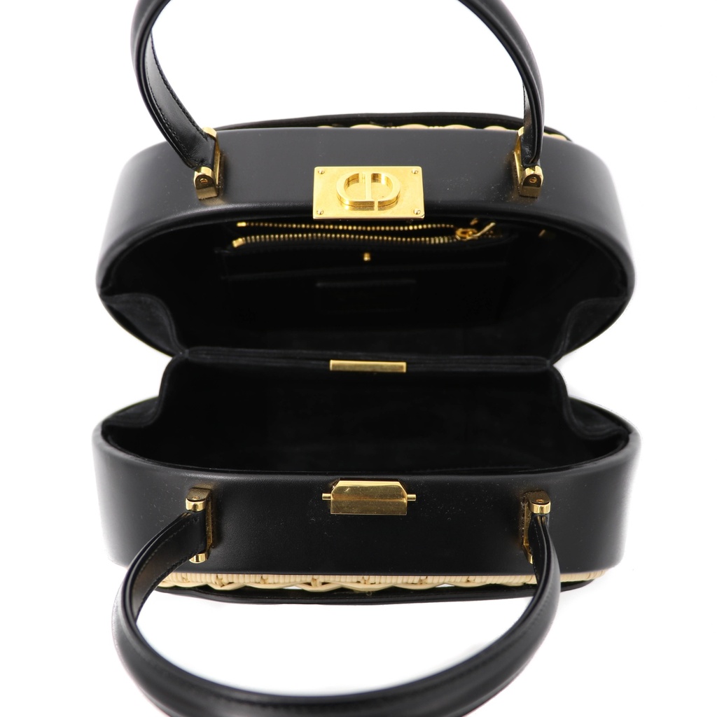Christian Dior Wicker CD Vanity Bag crafted from black leather and natural wicker